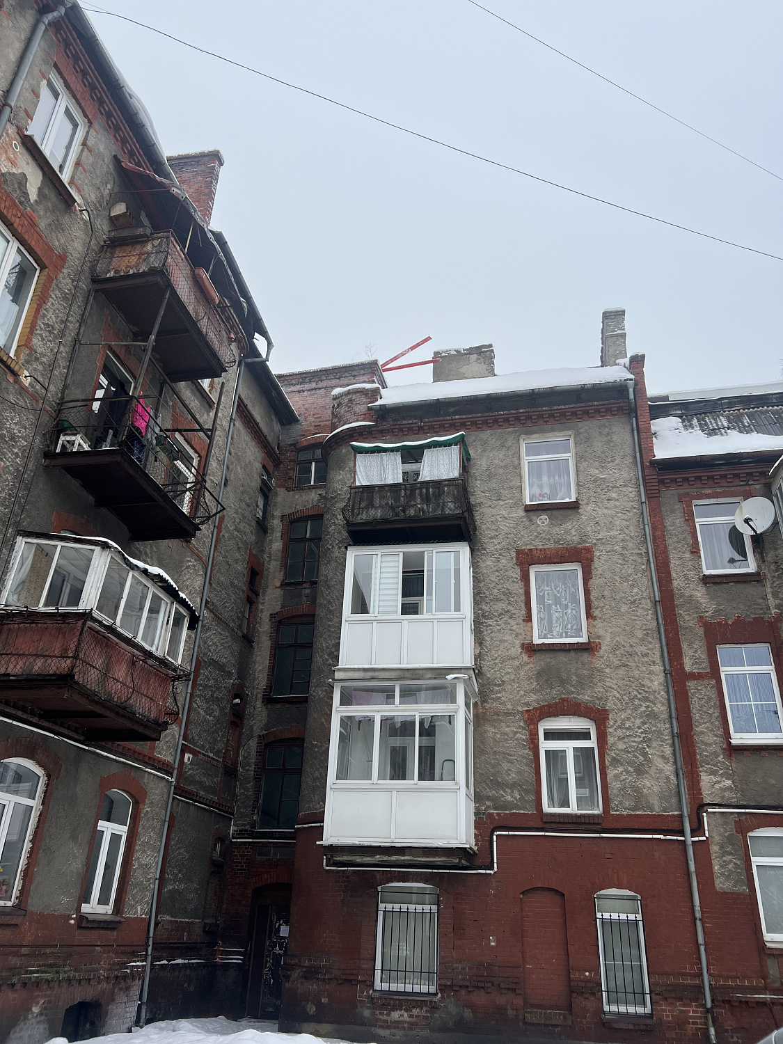 Порт Артур: приступили к капремонту фасада дома № 13